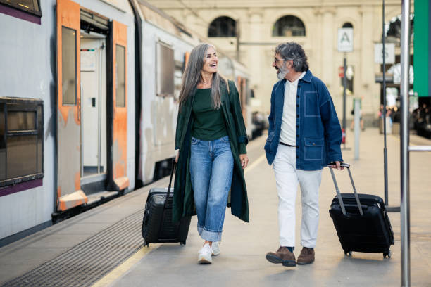 Happy mature couple going on a journey