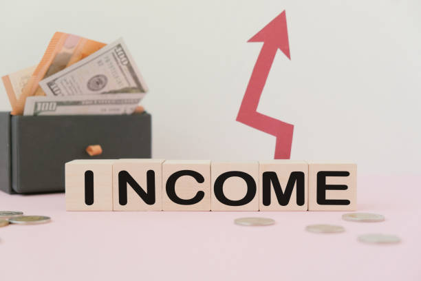 increase in income, lettering on wooden cubes