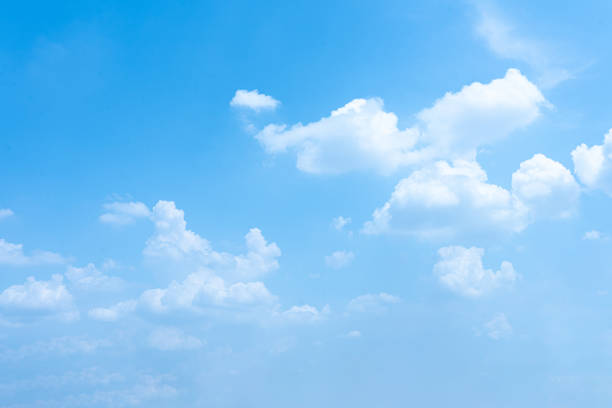 istock Blue Sky with Fluffy Clouds on a Bright Summer Day 2154722814