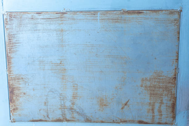 Aged vintage paper texture with a grunge wooden pattern and rustic brown surface