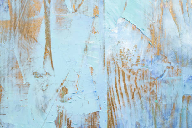 istock Textured plaster effect on wood grain with gold and blue colors, abstract backdrop 2154724264