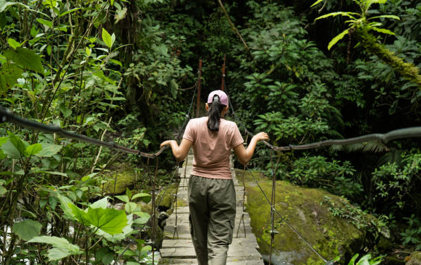 istock young latina woman hiking 2154724365
