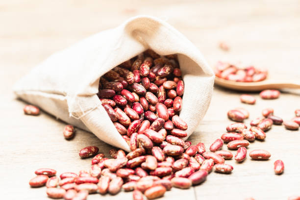 Flowered kidney beans on wooden background