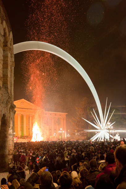 People in Piazza Bra attend the final act of the celebrations of Christmas in Verona, and a large puppet burns just steps from the Arena. Traditionally, when Christmas time is running out, large bonfires are made in Verona and province, to remember an ancient propitiatory rite for the transition from the past year to the new