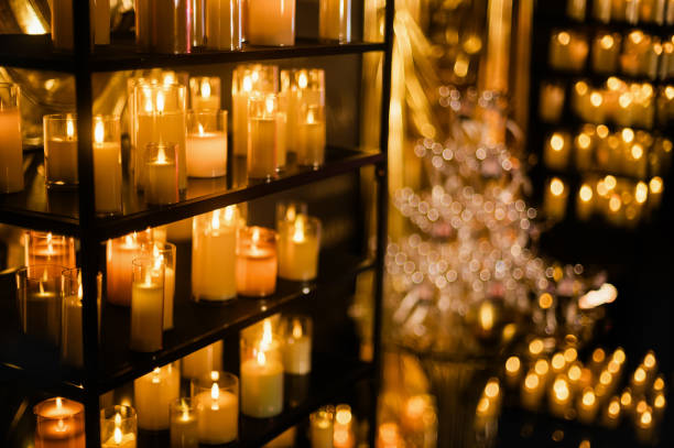istock Holiday Background with Burning Golden Candles 2154727739