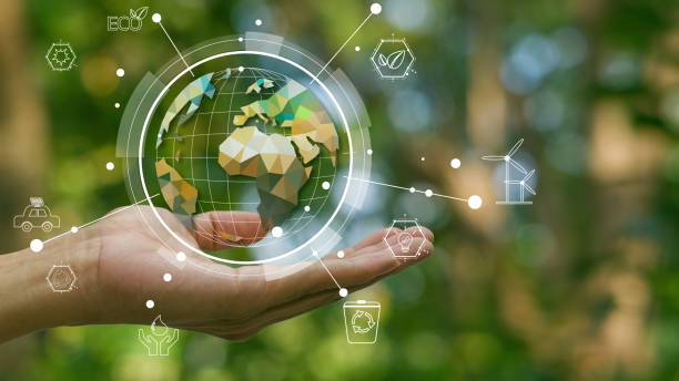 istock Environment concept. Green earth planet in hands with shining light. Save and protection Earth. sustainable and corporation development, green eco friendly. 2154728321