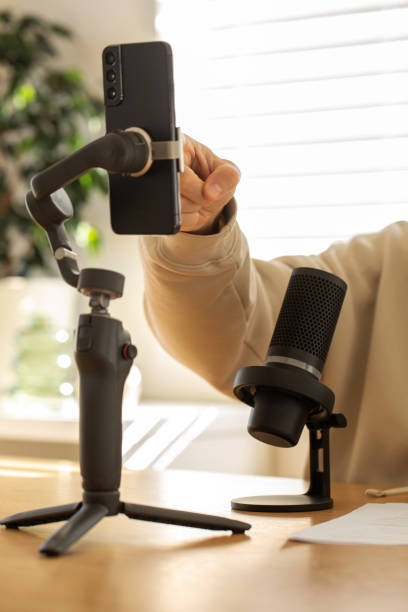 istock A smartphone on a gimbal with microphone, for content creators. Podcast microphone setup. Blogging 2154729884
