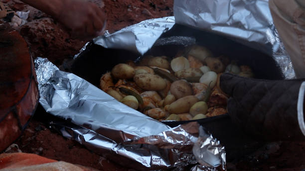 Jordanian underground oven cooking, Zarb, Wadi Rum.