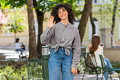 young-woman-smiling-friendly-at-camera-waving-hands-hello-hi-greeting-or-goodbye-in-city-street.jpg?b=1&s=170x170&k=20&c=tFlHtzooX9cFII6vmp3ukVHrTs8uLfbixrtquw-faAU=