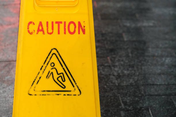 istock Worn-out wet floor warning sign. 2154736061