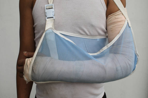 istock worker or poor person with an arm sling 2154738067