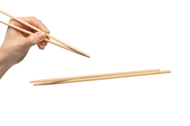 istock Sushi chopsticks isolated on a white background. 2154738405