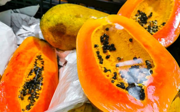 istock Wrapped packaged sliced papaya fruit in Playa del Carmen Mexico. 2154740272