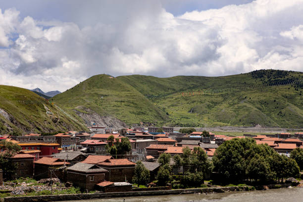 The red tiled rooftops of houses in the village of Tagong, located in the historic Kham region of Eastern Tibet