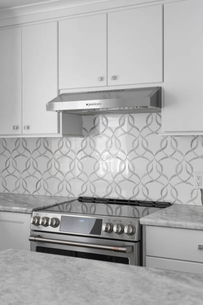istock Luxury Modern Kitchen Details and Backsplash Design with Stainless Steel Appliance 2154741751