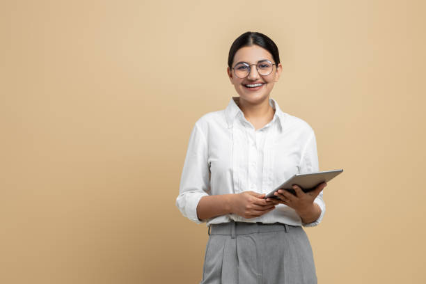 istock Joyful female using touchpad device for online shopping 2154743368