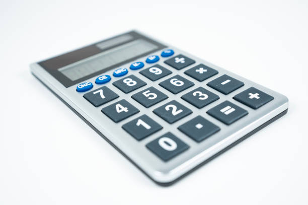 A Calulator Isolated On A White Background Angled From Left To Right