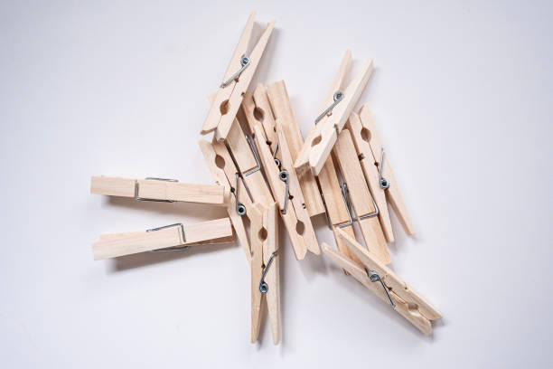 istock A Stack Of Clothespins Pegs On A White Background For Drying Clothes 2154746854