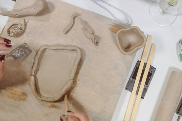 istock Close up on a woman working with clay. 2154748090