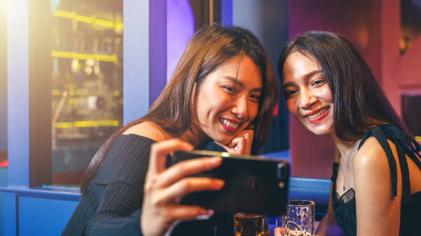 istock Two young women taking a selfie. 2154751043