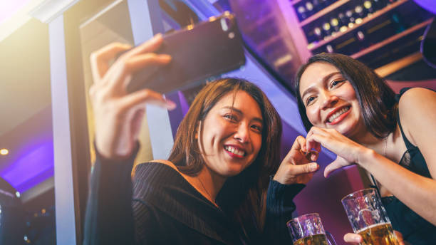 istock Two young women taking a selfie. 2154751046
