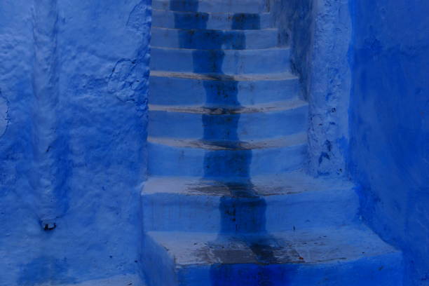 istock Steps in a blue painted street, Chefchaouen, Morocco 2154751506