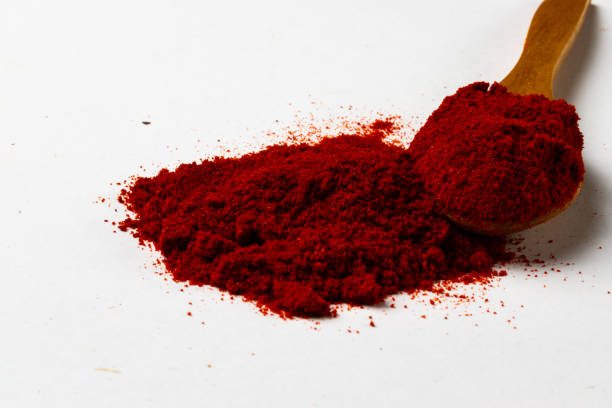 istock Red paprika and wooden spoon 2154753143