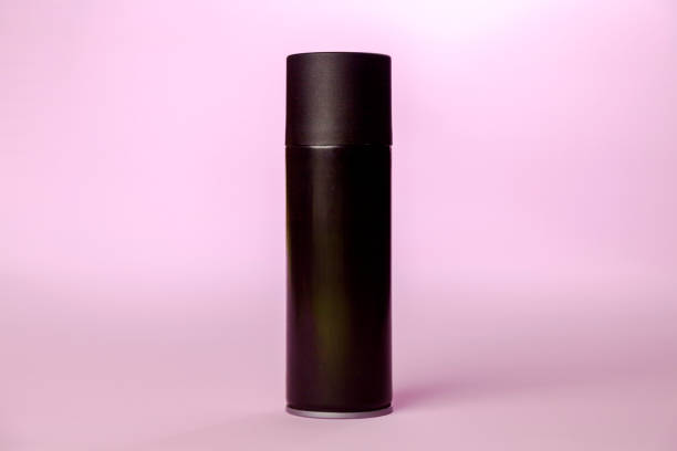 istock Black spray can on pink background. 2154756374
