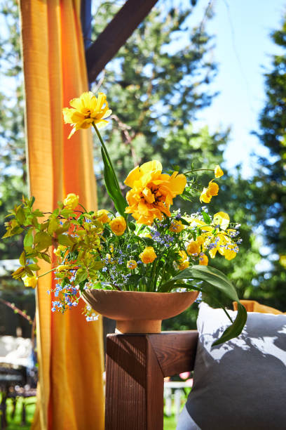 istock Floral composition in a vase on the summer veranda 2154756702