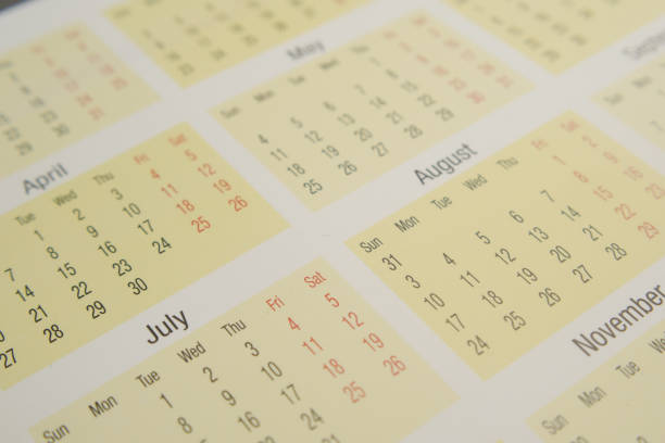 istock detail shot of a calendar on table, 2154757725