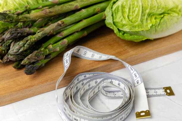 istock Fresh vegetables on the kitchen table cabbage, salad, asparagus. 2154761459
