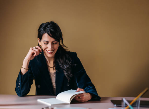 istock Professional Woman Enjoying Her Work in a Modern Office 2154762870