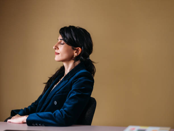 istock Professional Woman in Thoughtful Pose at Office 2154762946
