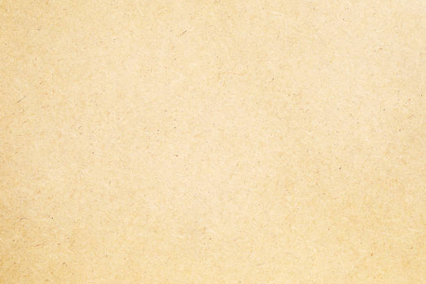 istock Brown crumpled paper with grains texture closeup 2154763785