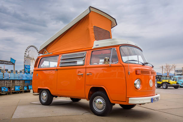 Scheveningen, the Netherlands - May 26, 2024: orange VW kombi camper wagen at Aircooled classic car show