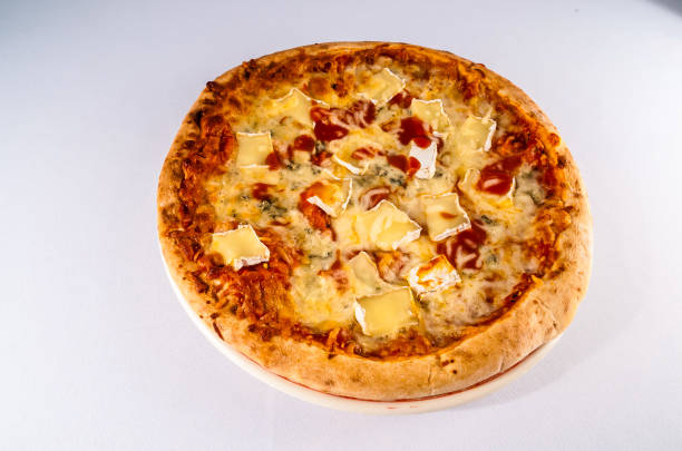 istock A pizza with cheese and tomato sauce on a white plate 2154770818