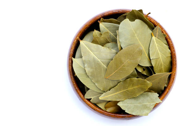 istock Dried bay leaves on white background. 2154771209