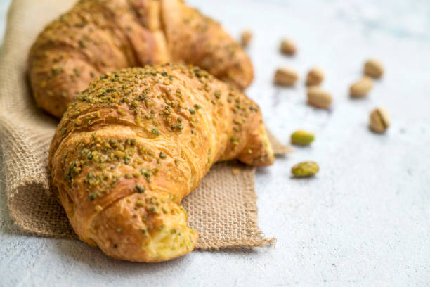 istock freshly baked pistachio croissants 2154775462