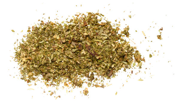 istock Dry ground basil leaves and crushed sun-dried tomatoes on isolated background 2154775579