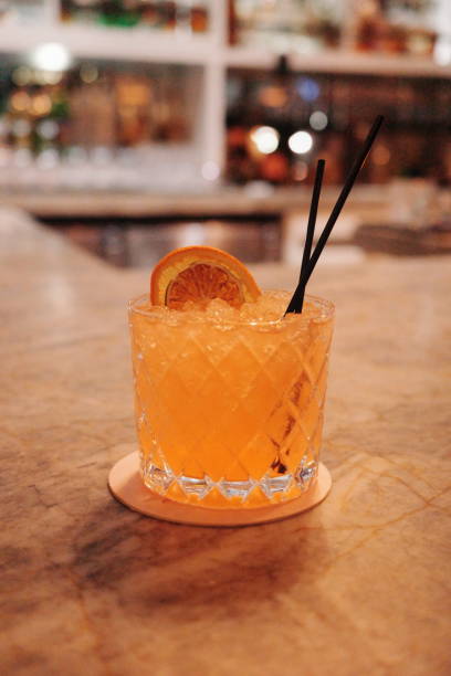 istock Orange Alcoholic Beverage Cocktail with Fruit on Bar 2154777989