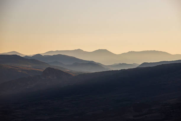 istock Atmospheric perspective in the mountains at sunset 2154779665