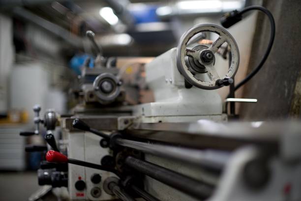 istock Old metal lathe machine, retro machine background. 2154784934