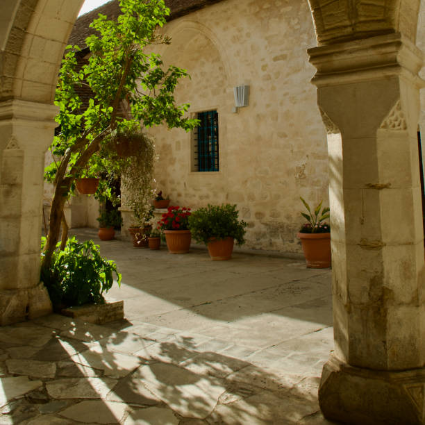 istock Arches with flower pots and pretty flowers 2154785211
