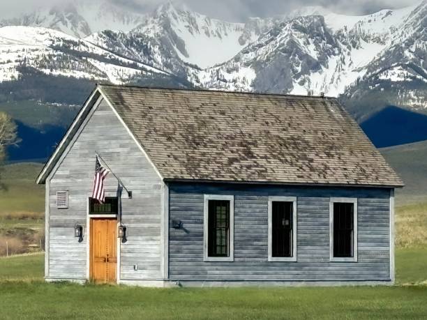 istock Old Church against Snow Covered Mountains - close up 2154785888