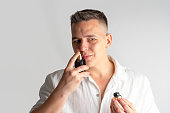 man-applying-perfume.jpg?b=1&s=170x170&k=20&c=fxI2MMDHr24VOStz_-uI5lB3g0kQasOeaubOUYbs5Lo=