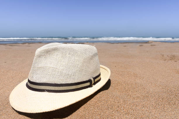 Sun hat at the beach during summer day. No people