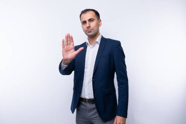 istock Smart handsome caucasian man in a white shirt on a white background 2154795193