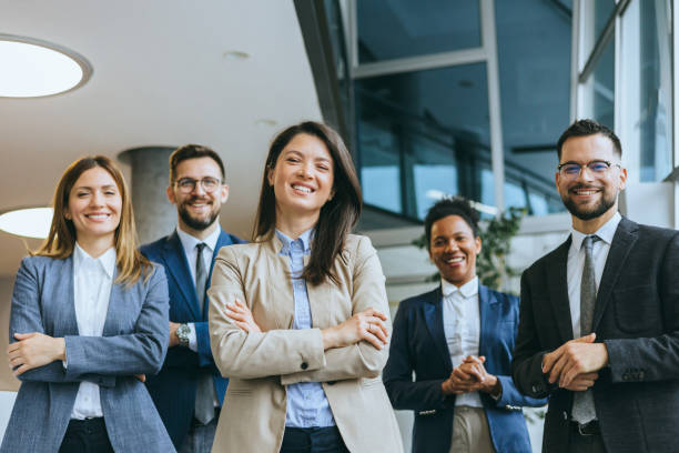 istock Smiling business team presenting in office 2154795265