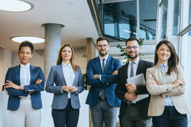 istock Confident business team standing together 2154795274