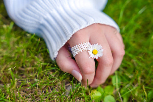 Connect to nature Close up hand with Flower in hand